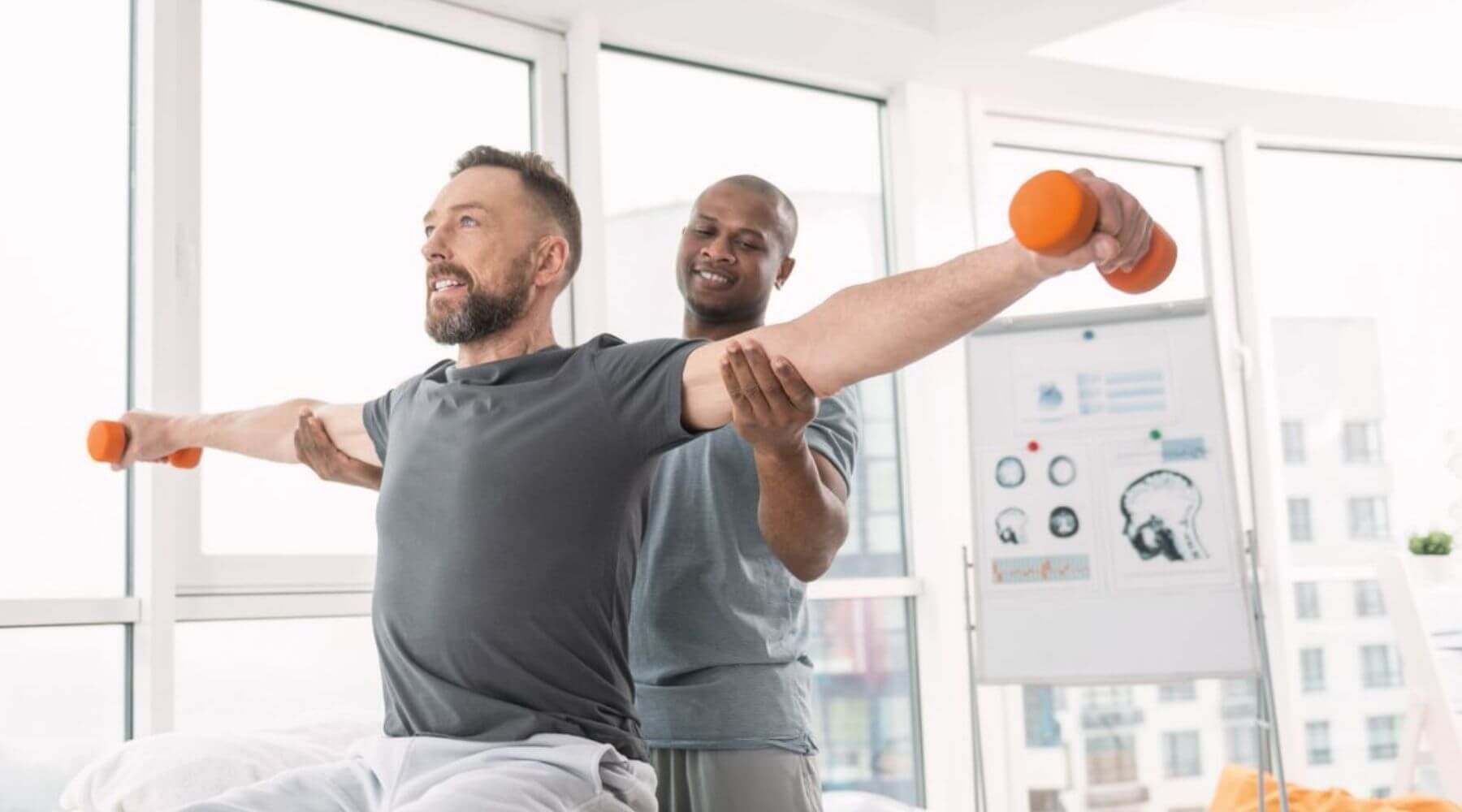 Patient holding weights long right aligned