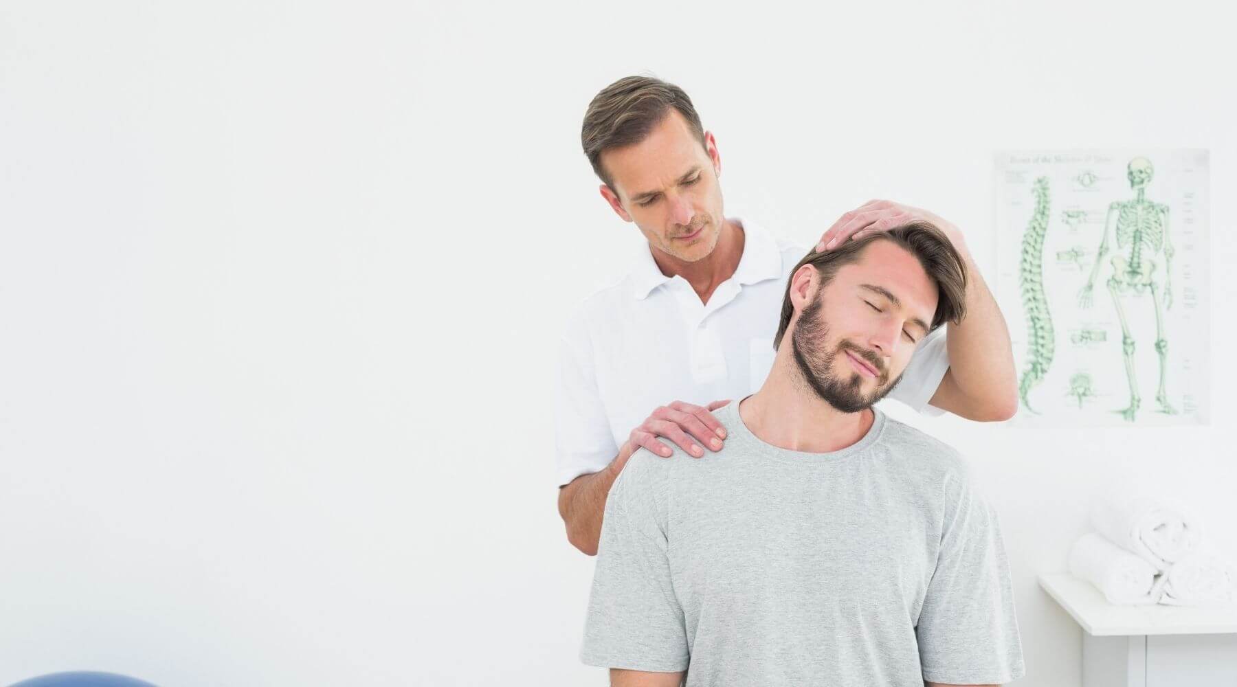 Therapist bending patient neck white background