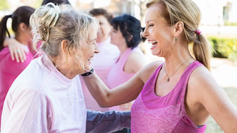 Senior female friends at charity event
