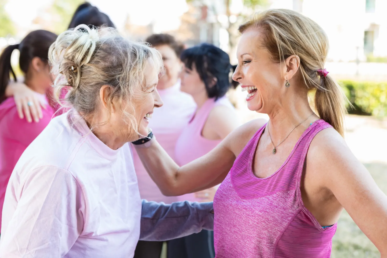 Senior female friends at charity event