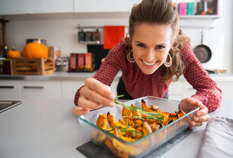 woman cooking vegetables