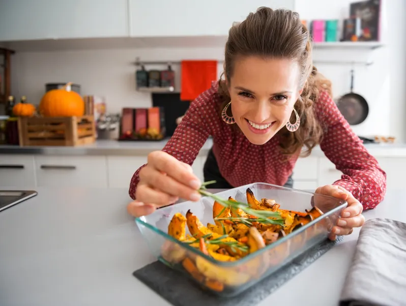 woman cooking vegetables